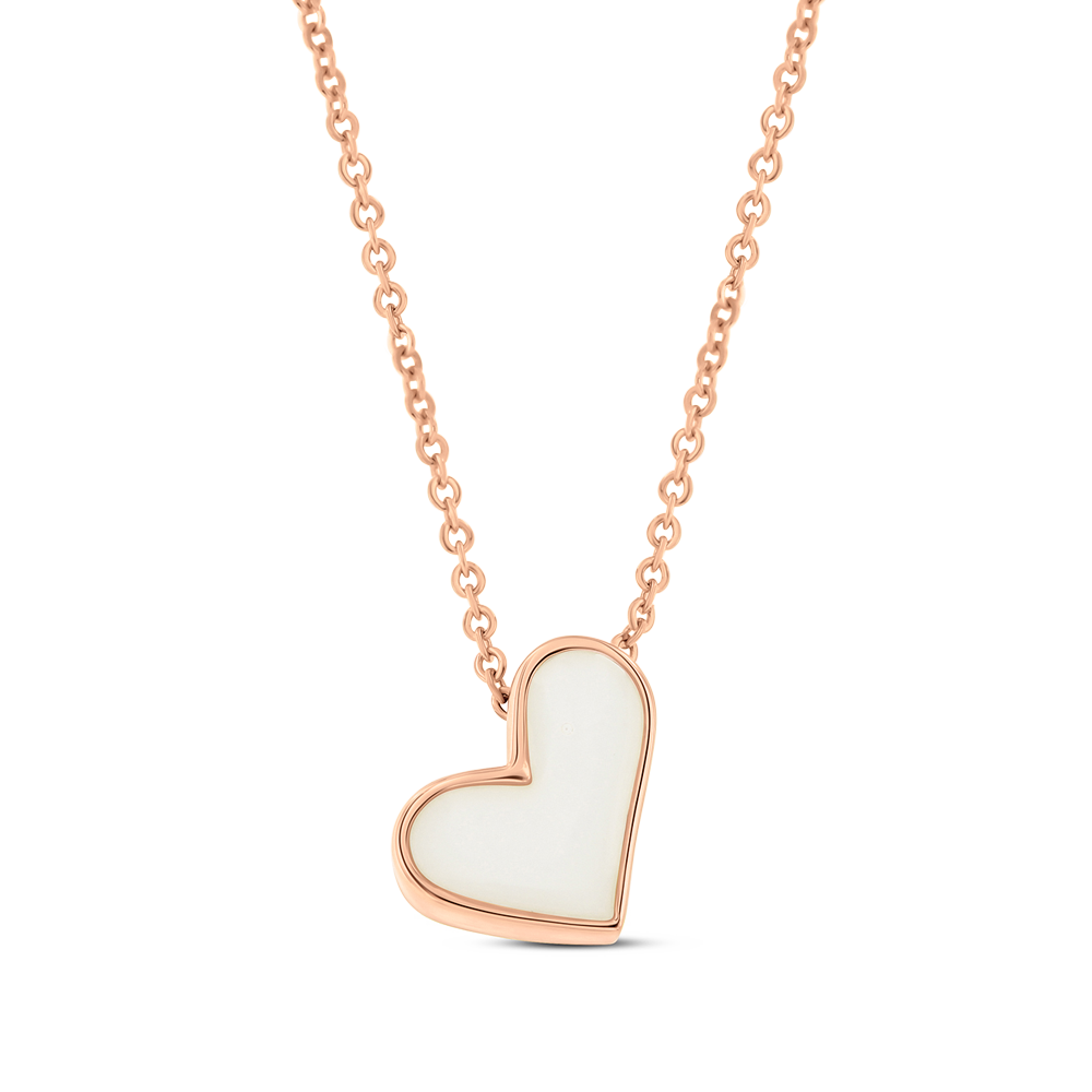 Le collier Louisa | Collier Lait Maternel Or de Mama Jewels est un collier chaîne en or doté dun pendentif en forme de cœur blanc en or rose et blanc, sur fond pêche.