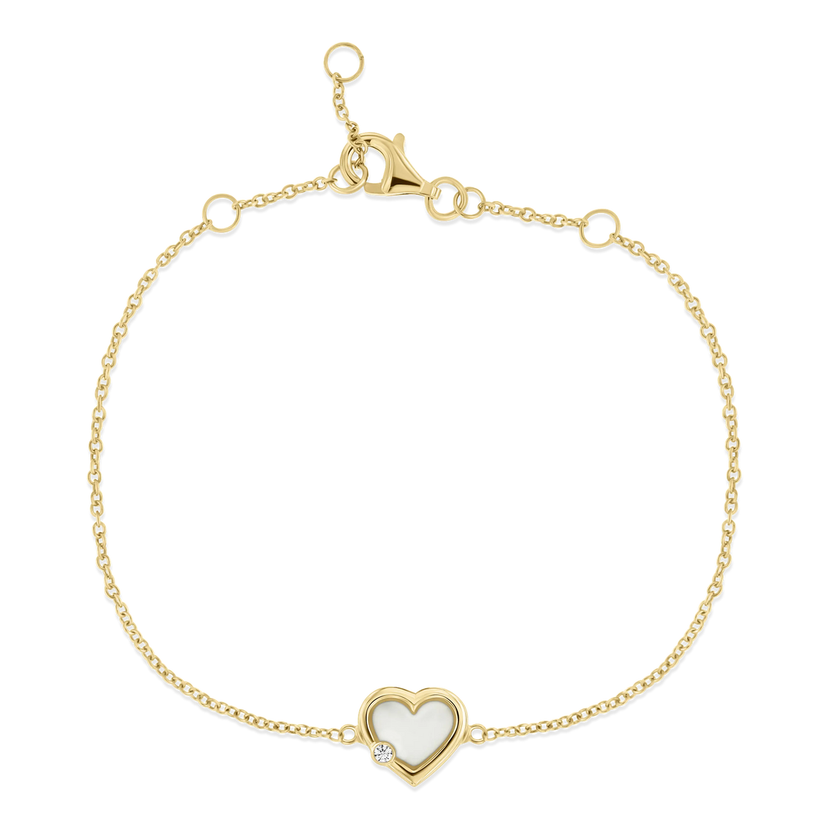 Bracelet en or jaune avec un pendentif en forme de cœur en résine contenant du lait maternel et un zircon.
