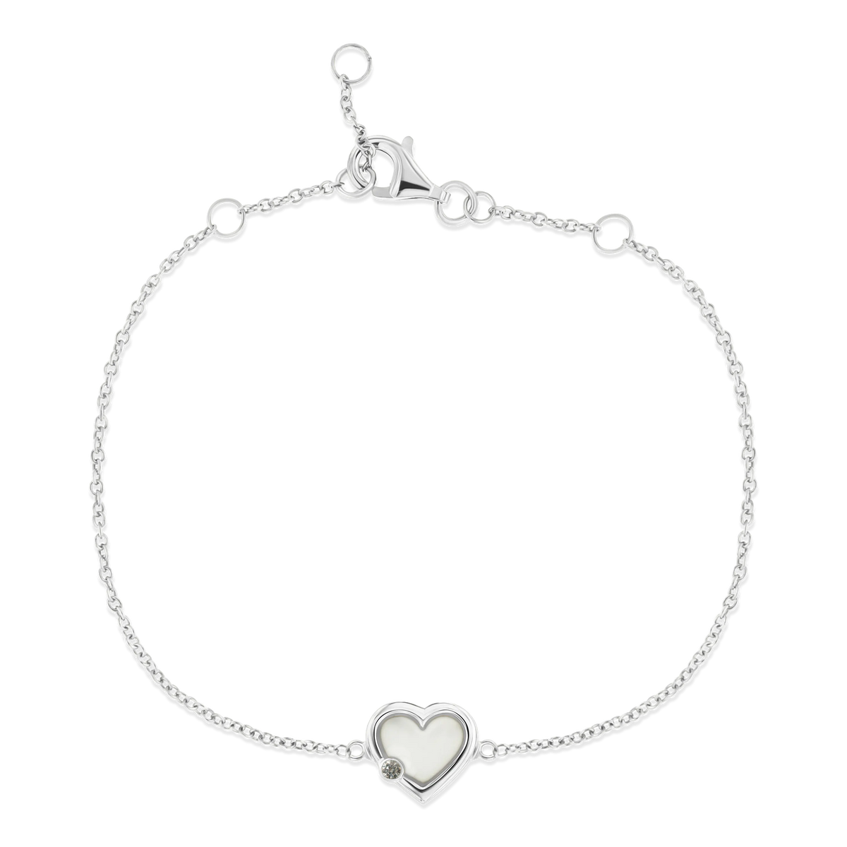 Bracelet en or blanc avec un pendentif en forme de cœur en résine contenant du lait maternel, chaîne délicate.