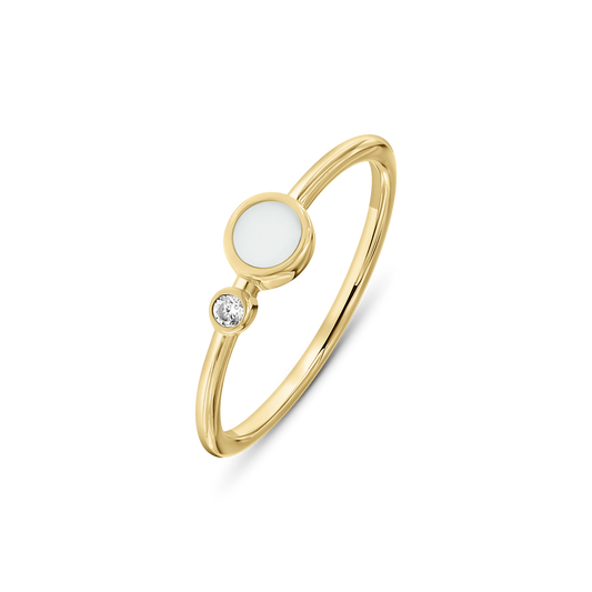 Bague en or jaune avec une résine de lait maternel ronde et un zircon brillant sur le côté.