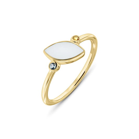 Bague en or jaune avec résine de lait maternel en forme de feuille et zircon bleu.